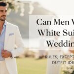 Can men wear white suits to a wedding as guests